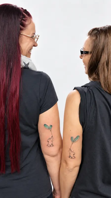 Zwei aufeinander abgestimmte Partnertattoos am Oberarm. Tätowiert bei Tattoo Overkill in Gifhorn