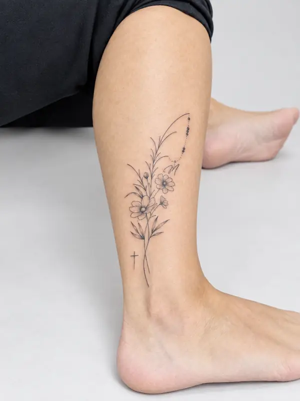 Blüten, Fessel. Tätowiert bei Tattoo Overkill in Gifhorn